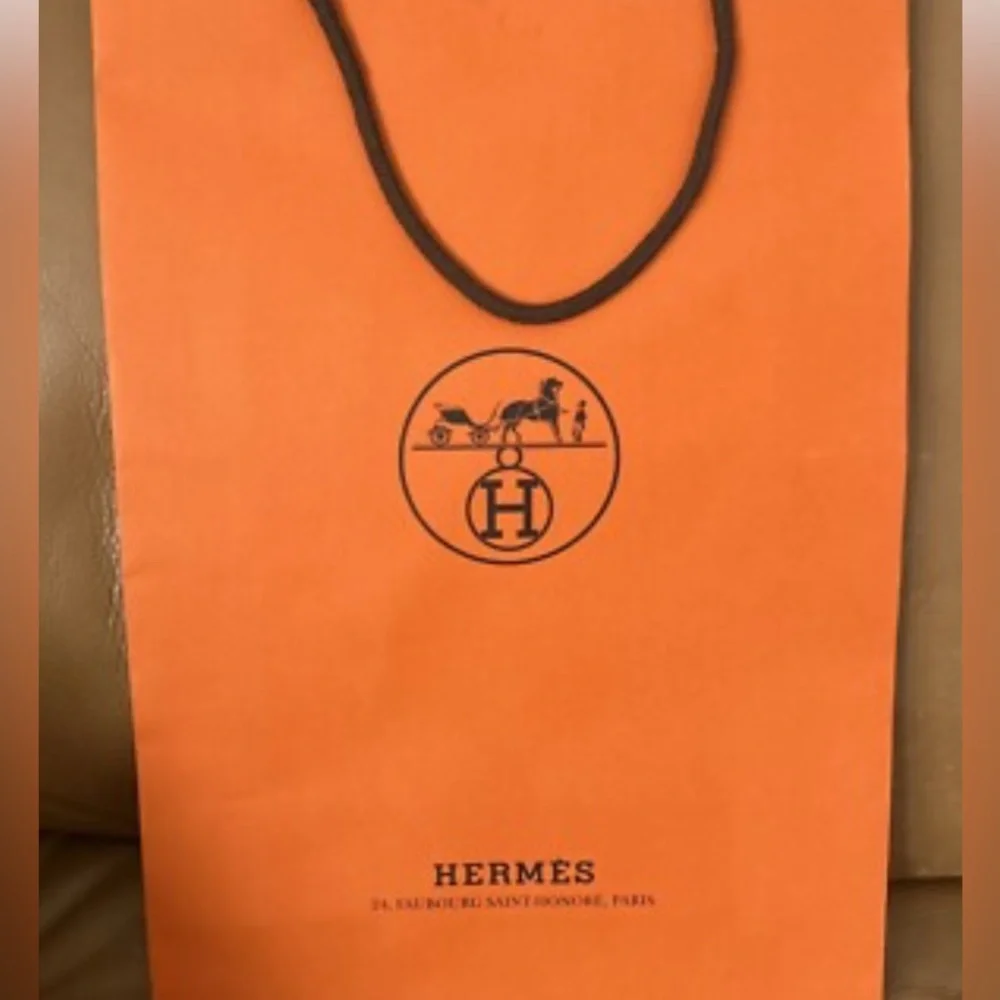 . HERMES ORANGE CARRE STAIRS HAND TOWEL NWT